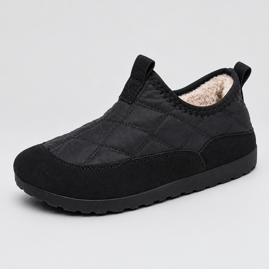 Zapato negro sobre fondo gris