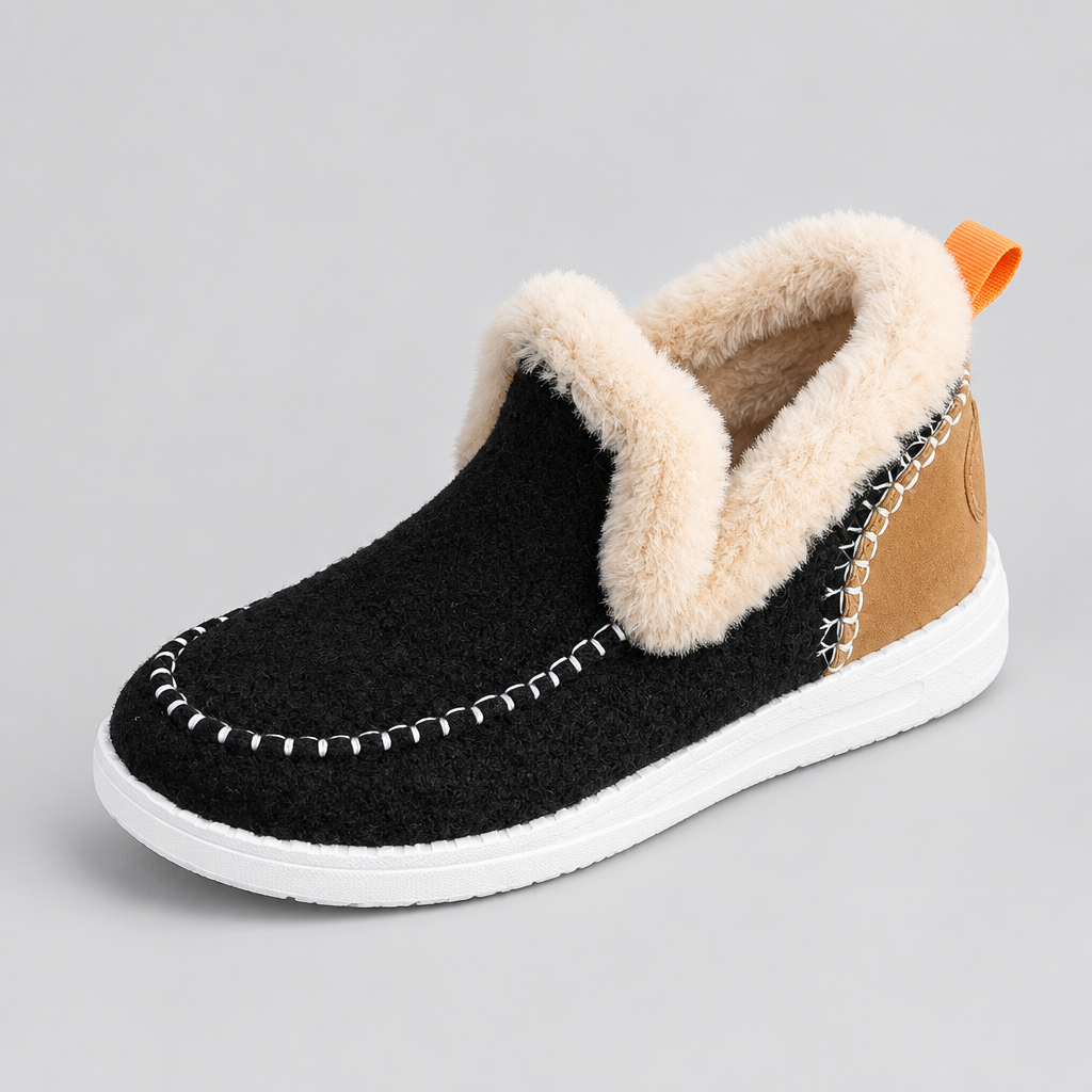 Zapato negro sobre fondo gris